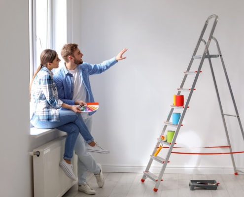 Young,Couple,With,Color,Palette,Indoors